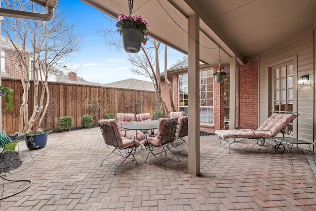 view of patio / terrace featuring a fenced backyard and outdoor dining space