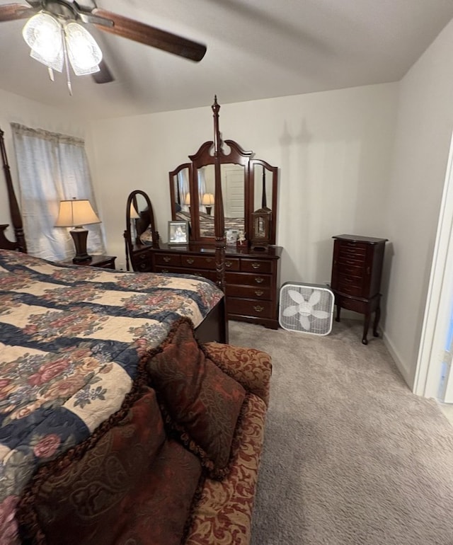 bedroom with carpet, baseboards, and ceiling fan