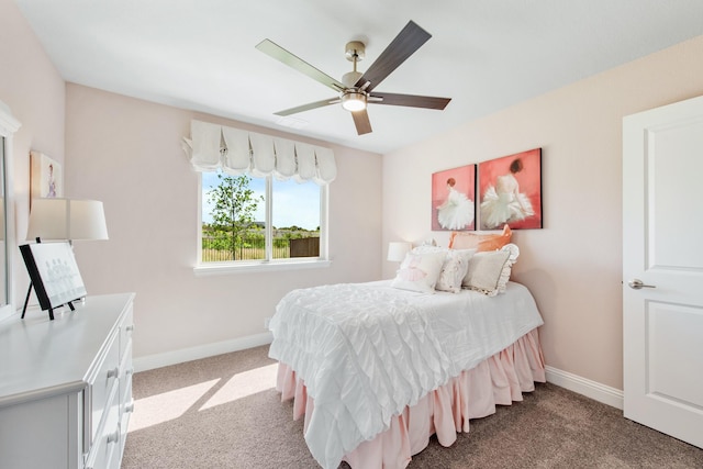 bedroom with carpet, baseboards, and a ceiling fan