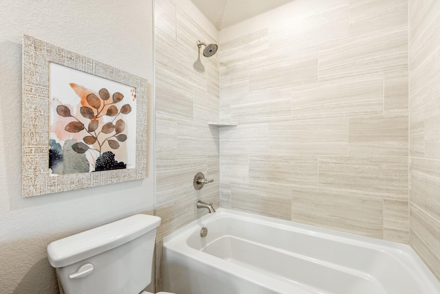 bathroom with shower / tub combination and toilet