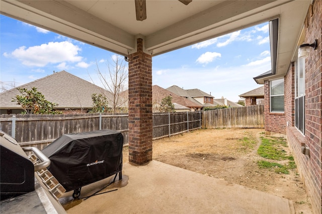 view of yard featuring a fenced backyard and a patio area