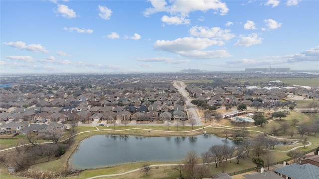 bird's eye view featuring a residential view and a water view