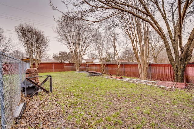 view of yard with a fenced backyard