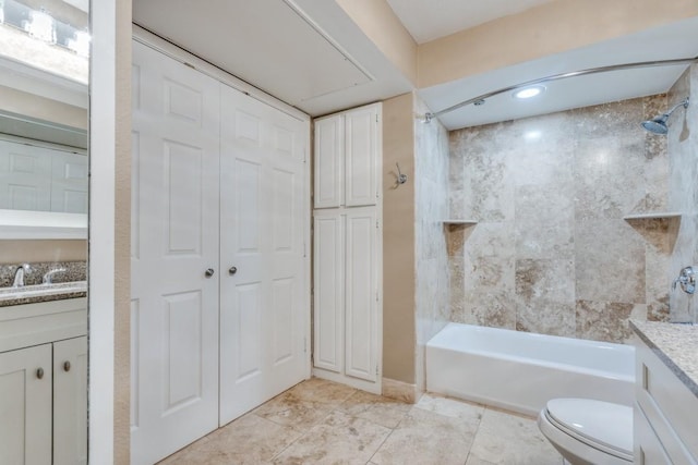 full bath with toilet, a closet, and vanity