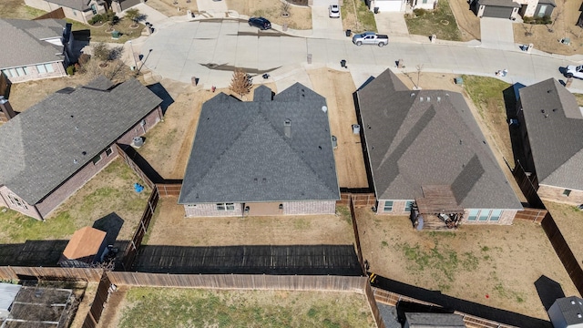 birds eye view of property with a residential view