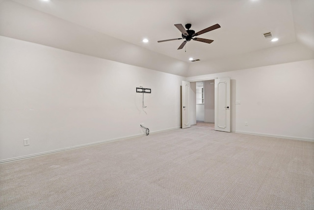 unfurnished room with lofted ceiling, baseboards, visible vents, and recessed lighting