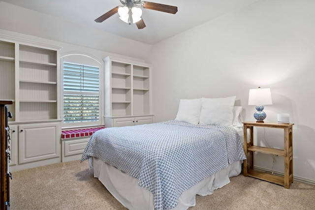 bedroom with light colored carpet and ceiling fan