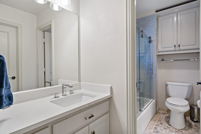 bathroom featuring shower / bath combination with glass door, vanity, and toilet