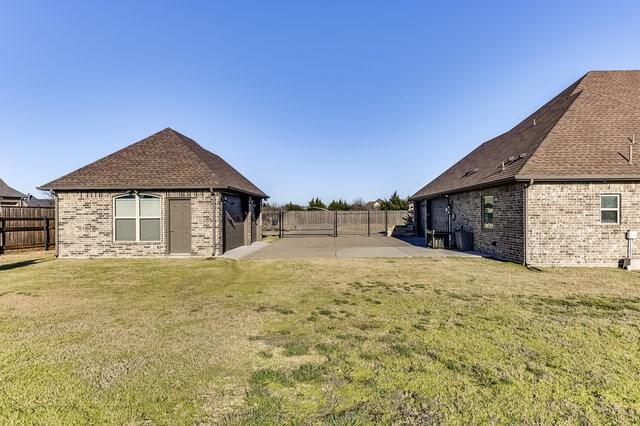 view of yard featuring a fenced backyard and a patio