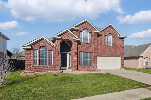 traditional-style house featuring concrete driveway, brick siding, and a front yard