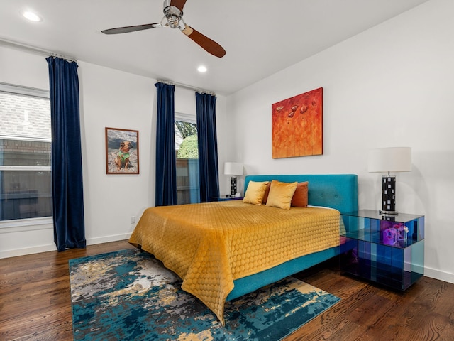 bedroom with ceiling fan, recessed lighting, wood finished floors, and baseboards