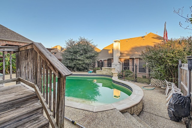 view of pool featuring a fenced in pool and fence