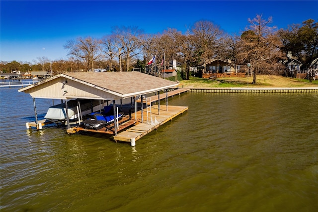 dock area featuring a water view and boat lift