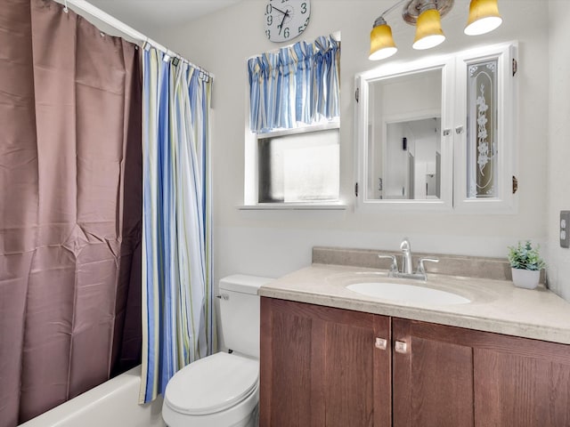 full bath featuring shower / tub combo, vanity, and toilet