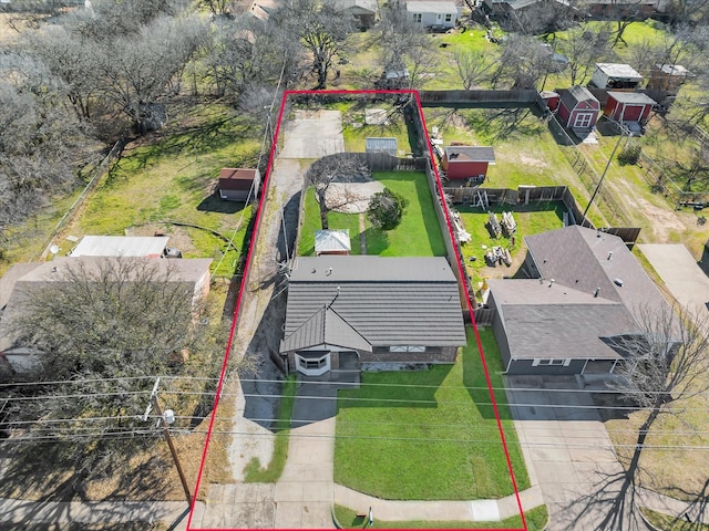 birds eye view of property with a residential view