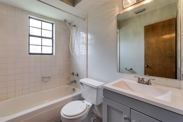 bathroom featuring shower / washtub combination, visible vents, vanity, and toilet