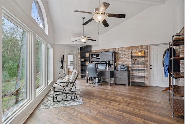 home office featuring a ceiling fan, high vaulted ceiling, and wood finished floors