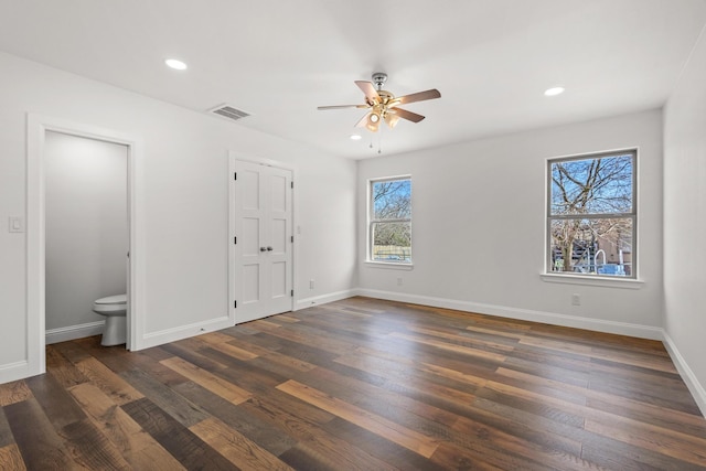 unfurnished bedroom featuring dark wood finished floors, recessed lighting, visible vents, a ceiling fan, and baseboards