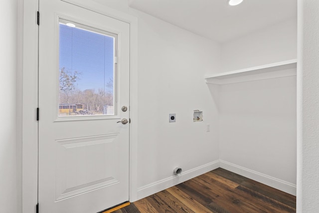 clothes washing area featuring laundry area, baseboards, dark wood-style flooring, hookup for a washing machine, and electric dryer hookup