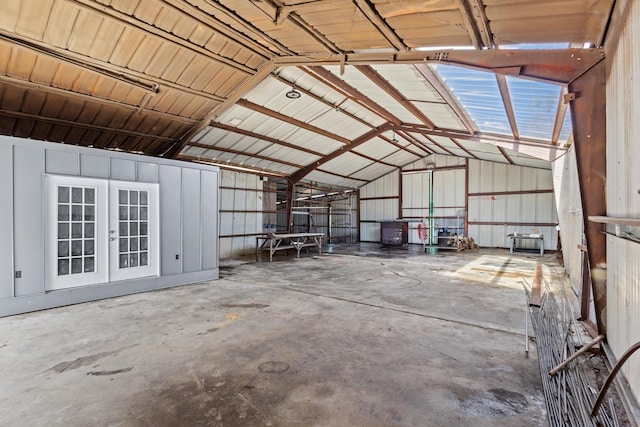 garage featuring metal wall and french doors