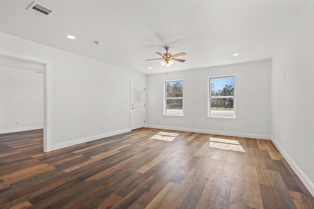 unfurnished room featuring recessed lighting, visible vents, a ceiling fan, wood finished floors, and baseboards