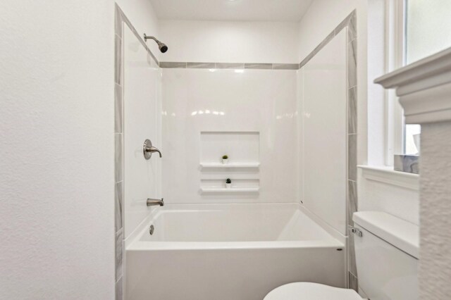 bathroom with  shower combination and toilet