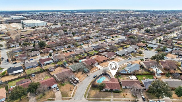 birds eye view of property with a residential view