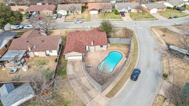 birds eye view of property with a residential view