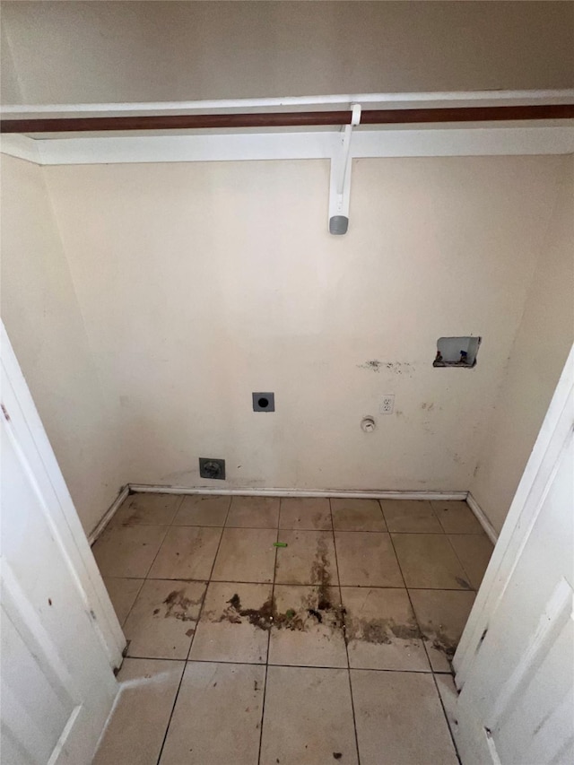 clothes washing area featuring gas dryer hookup, hookup for a washing machine, and hookup for an electric dryer