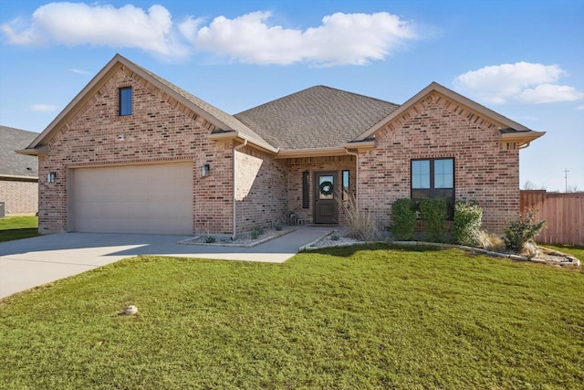 ranch-style house featuring an attached garage, brick siding, a shingled roof, concrete driveway, and a front yard