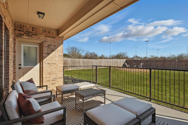 view of patio featuring a fenced backyard and an outdoor living space