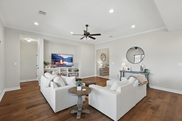 living area with baseboards, wood finished floors, visible vents, and recessed lighting