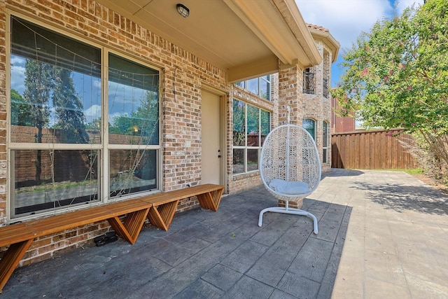 view of patio with fence