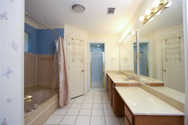 full bathroom featuring a textured ceiling, a washtub, visible vents, a stall shower, and wallpapered walls