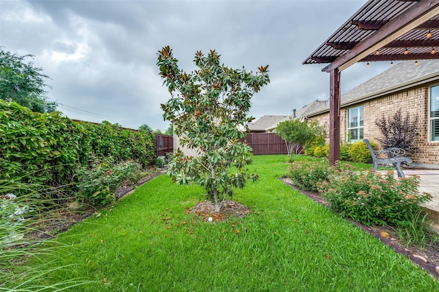 9804 Bitterroot Dr, Little Elm, TX 75068 - fenced backyard with a pergola