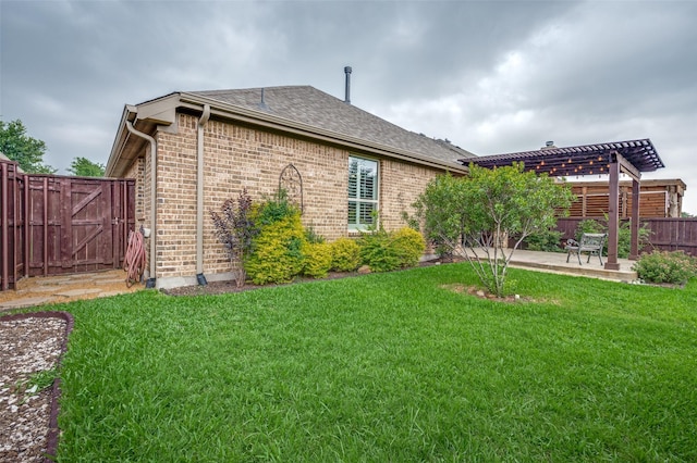 9804 Bitterroot Dr, Little Elm, TX 75068 - rear view of house featuring a patio, a fenced backyard, a pergola, brick siding, and roof with shingles
