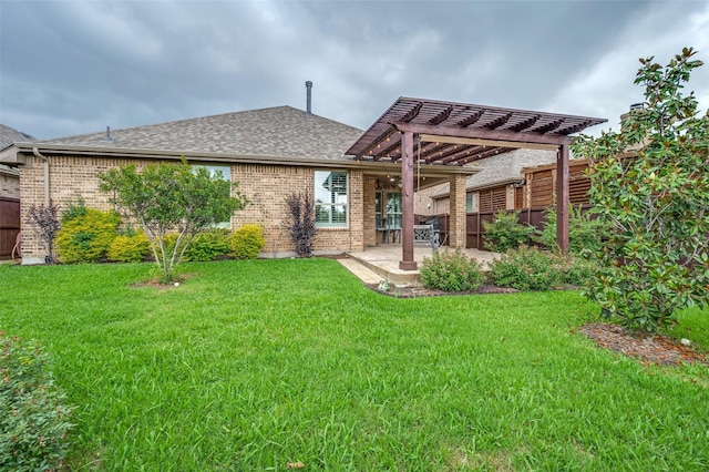 9804 Bitterroot Dr, Little Elm, TX 75068 - back of property with a pergola, brick siding, a patio area, and a shingled roof