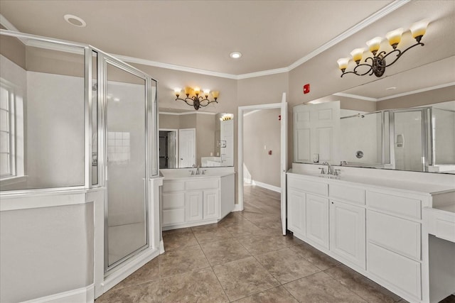 bathroom featuring ornamental molding, two vanities, a sink, and a shower stall