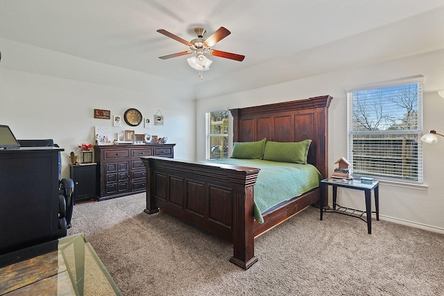 bedroom featuring ceiling fan, carpet flooring, and baseboards