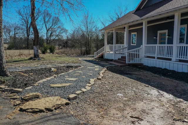 view of yard with a porch