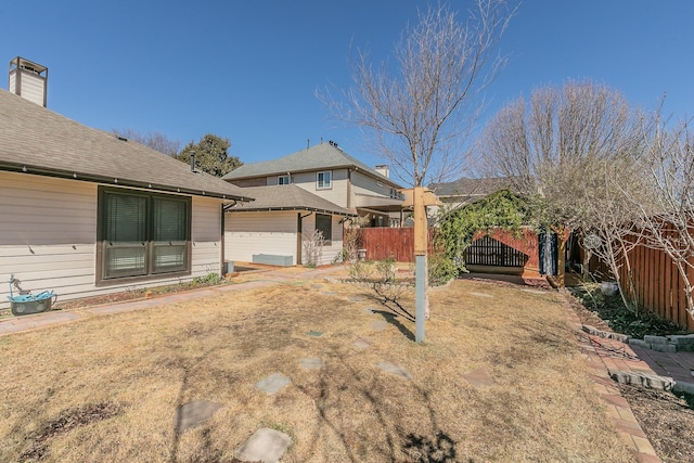 view of yard with a gate and fence