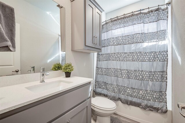 841 Holler Loop, Fort Worth, TX 76247 - bathroom featuring vanity, toilet, and shower / tub combo