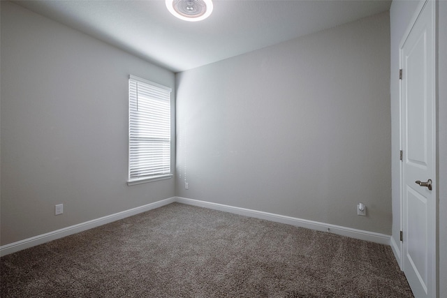 841 Holler Loop, Fort Worth, TX 76247 - empty room featuring carpet floors and baseboards
