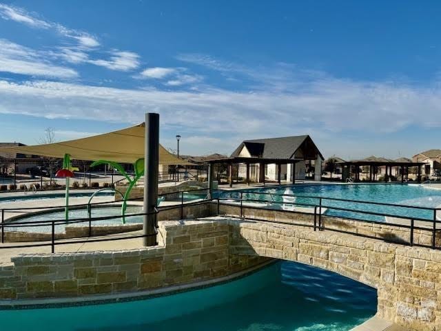 community pool with fence