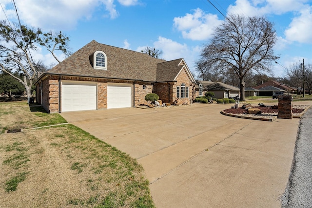 view of property exterior with concrete driveway, brick siding, an attached garage, and roof with shingles