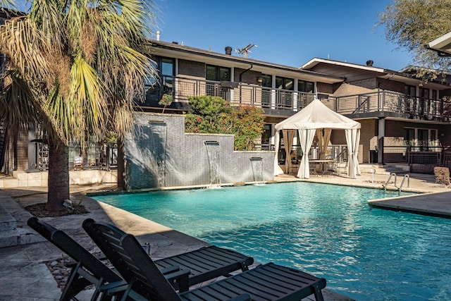 community pool featuring a patio