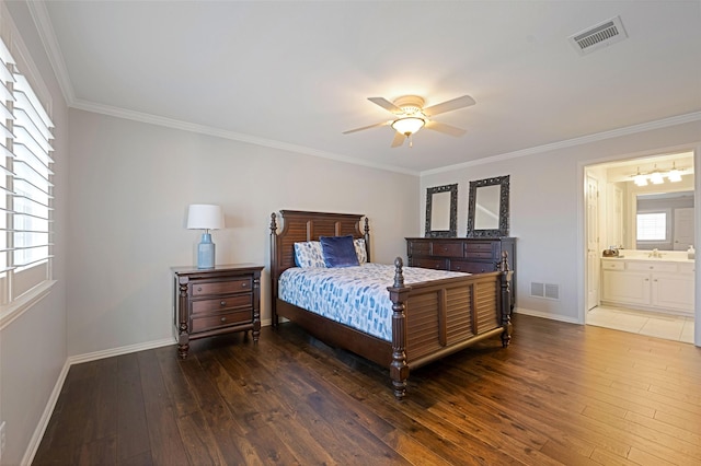 bedroom featuring hardwood / wood-style flooring, baseboards, and visible vents