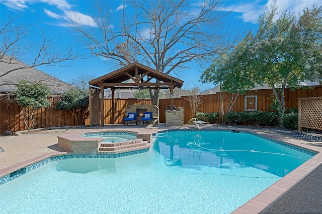 view of pool featuring a patio area, a fenced backyard, a diving board, and a gazebo