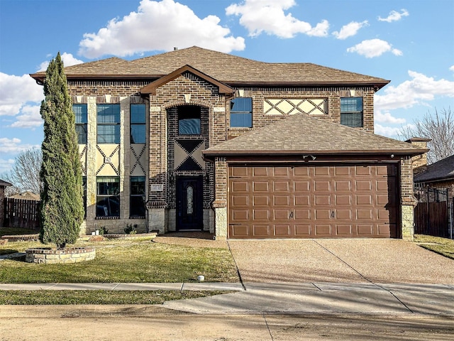 view of front of house with a front lawn, concrete driveway, brick siding, and an attached garage