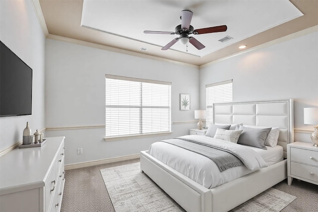 bedroom featuring carpet floors, visible vents, ornamental molding, and baseboards